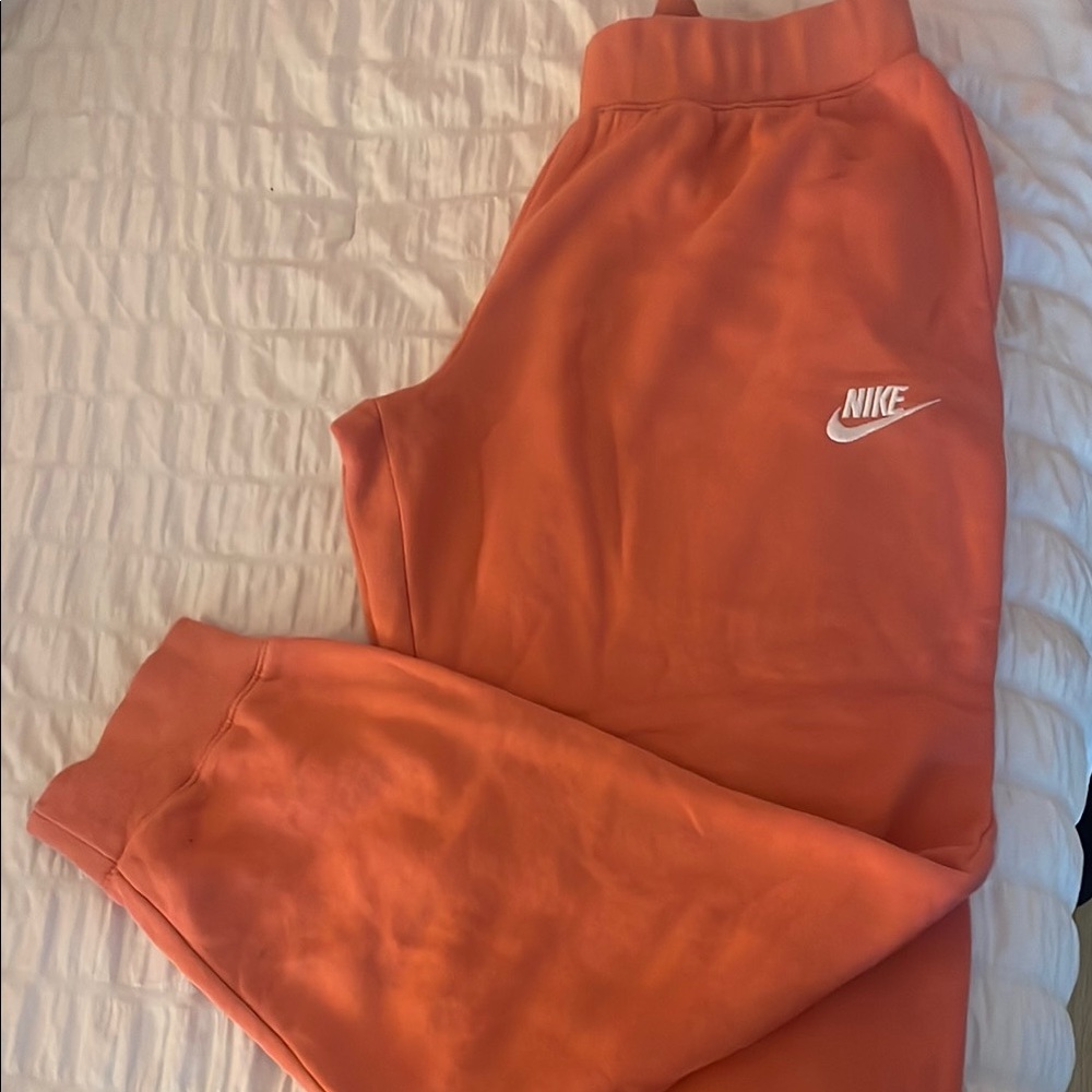 Nike Orange Jogger Sweatpants with Tapered Design